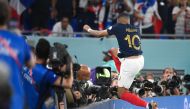 France's forward #10 Kylian Mbappe celebrates scoring his team's second goal during the Qatar 2022 World Cup Group D football match between France and Denmark at Stadium 974 in Doha on November 26, 2022. (Photo by FRANCK FIFE / AFP)