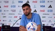 Uruguay's midfielder Rodrigo Bentancur attends a press conference at the Qatar National Convention Center (QNCC) in Doha on November 27, 2022, on the eve of the Qatar 2022 World Cup football match between Portugal and Uruguay. (Photo by Pablo PORCIUNCULA / AFP)