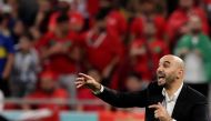 Morocco's coach Walid Regragui shouts instructions to his players from the touchline during the Qatar 2022 World Cup Group F football match between Belgium and Morocco at the Al-Thumama Stadium in Doha on November 27, 2022. (Photo by JACK GUEZ / AFP)