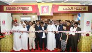 Panakkad Swadikali Shihab Thangal; Safari Group of Companies Group Chairman, Hamad Dafar Abdel Hadi Al Ahbabi; Chairman Aboobacker Madapat; Director and Group General Manager, Zainul Abideen; Managing Director Shaheen Backer; and others inaugurating the new hypermarket. 