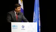 Uruguay's Minister of Environment Adrian Peٌa delivers a speech during the UN's First Session of the Intergovernmental Negotiating Committee (INC-1) to develop a legally binding instrument on plastic pollution, in Punta del Este, Maldonado department, Uruguay on November 28, 2022.  (Photo by STRINGER / AFP)