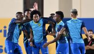 Ecuador’s midfielder Moises Caicedo (left), defender Angelo Preciado (centre) and forward Djorkaeff Reascos (right) take part in a training session. AFP