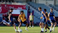 England’s Harry Kane, Trent Alexander-Arnold and Mason Mount train with teammates. REUTERS