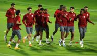 Qatar players during a training session at Aspire Zone, yesterday. REUTERS