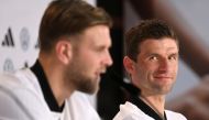 Germany's forward Thomas Mueller (R) and Germany's forward Niclas Fuellkrug (L) attend a press conference at the Al Shamal Stadium in Al Shamal, north of Doha on November 29, 2022, during the Qatar 2022 World Cup football tournament. (Photo by INA FASSBENDER / AFP)