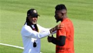 Cameroon coach Rigobert Song and Andre Onana. (Reuters/file photo)