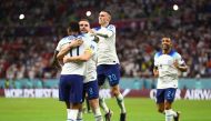 Marcus Rashford celebrates scoring their third goal with Jordan Henderson and Phil Foden during the Qatar World Cup Group B match against Wales at Ahmad Bin Ali Stadium on November 29, 2022. (REUTERS/Hannah Mckay)