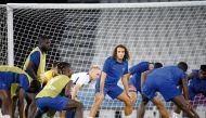 France’s midfielder Matteo Guendouzi takes part in a training session with teammates. AFP