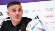 Canada's English coach John Herdman attends a press conference at the Qatar National Convention Center (QNCC) in Doha on November 30, 2022, on the eve of the Qatar 2022 World Cup football match between Canada and Morocco. (Photo by Patrick T. Fallon / AFP)