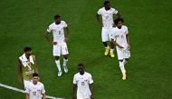 Qatar’s players react at the end of their match against the Netherlands. AFP