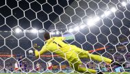 November 30, 2022 Poland's Wojciech Szczesny saves a penalty from Argentina's Lionel Messi REUTERS/Pedro Nunes