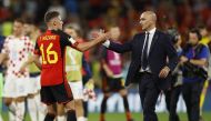 Belgium coach Roberto Martinez shakes hands with Thorgan Hazard after the match against Croatia, as Belgium are eliminated from the World Cup, at the Ahmad Bin Ali Stadium, Al Rayyan, Qatar, on December 1, 2022. REUTERS/John Sibley