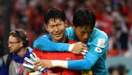 South Korea's Son Heung-min and Kim Seung-gyu celebrate after the match as South Korea qualify for the knockout stages Reuters/Matthew Childs