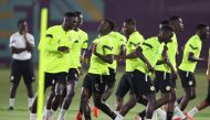 Senegal's players take part in a training session with teammates at Al Duhail SC in Doha on December 3, 2022 on the eve of the Qatar 2022 World Cup football match between Senegal and England. (Photo by JACK GUEZ / AFP)