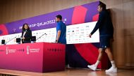 England's forward Harry Kane (right) and England's coach Gareth Southgate (centre) arrive for a press conference at the Qatar National Convention Center (QNCC) in Doha on Decmber 3, 2022 on the eve of the Qatar 2022 World Cup round of 16 football match between England and Senegal. (Photo by Paul ELLIS / AFP)