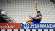 France's forward Kylian Mbappe kicks the ball during a training session at the Jassim-bin-Hamad Stadium in Doha on December 2, 2022, during the Qatar 2022 World Cup football tournament. (Photo by FRANCK FIFE / AFP)