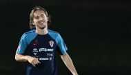 Croatia's midfielder Luka Modric takes part in a training session with teammates at the team's Al Erssal training camp in Doha on December 3, 2022, during the Qatar 2022 World Cup football tournament. (Photo by OZAN KOSE / AFP)