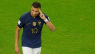 France's Kylian Mbappe celebrates scoring his team's third goal during the Qatar 2022 World Cup round of 16 football match between France and Poland at the Al Thumama Stadium in Doha on December 4, 2022. (AFP / Odd Andersen)