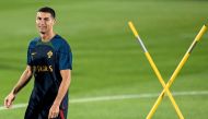 Portugal's forward Cristiano Ronaldo takes part with his teammates in a training session at Shahaniya Sports Club of Al Samriya Autograph Collection Hotel in Al Samriya, northwest of Doha on December 4, 2022 during the Qatar 2022 World Cup football tournament. (Photo by PATRICIA DE MELO MOREIRA / AFP)