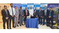 Hamad Al Mohannadi from the Ministry of Commerce and Industry and Lulu Exchange officials during the first lucky draw of the ongoing campaign at the D-Ring Road Branch.