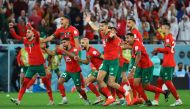 Morocco players celebrate after Achraf Hakimi scores the winning goal during the penalty shootout of the FIFA World Cup Qatar 2022 Round of 16 match against Spain at the Education City Stadium, Al Rayyan, Qatar, on December 6, 2022.  Reuters/Wolfgang Rattay