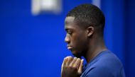 France's defender Ibrahima Konate waits ahead of a press conference at the Al Sadd SC Stadium in Doha on December 7, 2022, during the Qatar 2022 World Cup football tournament. - France and England will meet in one of the Qatar 2022 World Cup quarter-finals on December 10. (Photo by FRANCK FIFE / AFP)