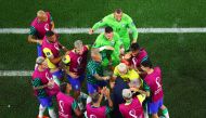 Brazil’s players dance with coach Tite as they celebrate a goal against South Korea on Monday. REUTERS