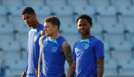 December 3, 2022 England's Marcus Rashford, Kieran Trippier and Raheem Sterling during training REUTERS/Hannah Mckay