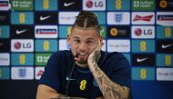 England's Kalvin Phillips speaks during a press conference at the Al Wakrah Stadium in Al Wakrah, Qatar, on December 8, 2022, in the build-up to the Qatar 2022 World Cup quarter-final football match between France and England. (Photo by Paul ELLIS / AFP)