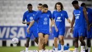 French players take part in a training session at Al Sadd SC yesterday. AFP