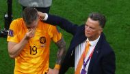 Netherlands coach Louis van Gaal and Wout Weghorst look dejected after the FIFA World Cup Qatar 2022 quarter-final penalty shootout as Netherlands are eliminated from the tournament by Argentina at the Lusail Stadium, Lusail, Qatar, on December 10, 2022.  REUTERS/Paul Childs
 