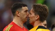 Argentina's Emiliano Martinez clashes with Netherlands' Luuk de Jong during their FIFA World Cup Qatar 2022 quarter final match at the Lusail Stadium, Lusail, Qatar, on December 9, 2022. REUTERS/Kai Pfaffenbach 
