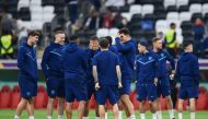 England's Kyle Walker with teammates on the pitch before the FIFA World Cup Qatar 2022 quarter final match against France at the Al Bayt Stadium, Al Khor, Qatar, on December 10, 2022.  REUTERS/Annegret Hilse