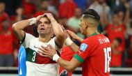 Portugal's Pepe reacts after a missed chance alongside Morocco's Jawad El Yamiq during their FIFA World Cup Qatar 2022 quarter final clash at the Al Thumama Stadium, Doha, Qatar, on December 10, 2022. REUTERS/Molly Darlington