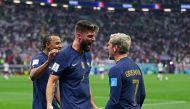 France's Olivier Giroud celebrates scoring their second goal with Antoine Griezmann and Jules Kounde during the FIFA World Cup Qatar 2022 quarter final match against England at the Al Bayt Stadium in Al Khor on December 10, 2022. REUTERS/Matthew Childs