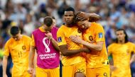 December 10, 2022 Netherlands' Denzel Dumfries and Luuk de Jong look dejected after being eliminated from the World Cup REUTERS/Bernadett Szabo