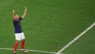 France's forward #10 Kylian Mbappe celebrate his team's victory in the Qatar 2022 World Cup quarter-final football match between England and France at the Al-Bayt Stadium in Al Khor, north of Doha, on December 10, 2022. (Photo by JACK GUEZ / AFP)