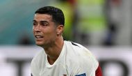 Portugal's forward #07 Cristiano Ronaldo reacts after his team lost the Qatar 2022 World Cup quarter-final football match between Morocco and Portugal at the Al-Thumama Stadium in Doha on December 10, 2022. (Photo by PATRICIA DE MELO MOREIRA / AFP)