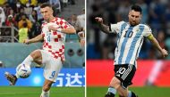 Croatia's midfielder Ivan Perisic (left) and Argentina's forward Lionel Messi during the Qatar 2022 World Cup quarter-final football tournament. (Photo by Nelson Almeida and Alfredo Estrella / AFP)