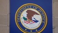  The crest of the United States Department of Justice (DOJ) is seen at their headquarters in Washington, DC, US, May 10, 2021. File Photo / Reuters