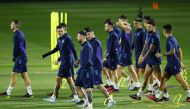 Argentina’s Lionel Messi with teammates during a training session at Qatar University Training Site 3, yesterday. REUTERS