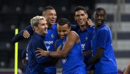 (From left) France’s players Antoine Griezmann, Kylian Mbappe, Jules Kounde, Raphael Varane and Randal Kolo Muani during a training session at the Jassim Bin Hamad Stadium, yesterday. AFP