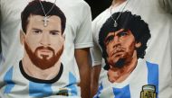 Argentina fans wear Lionel Messi and former player Diego Maradona shirts inside the stadium before the Argentina vs Croatia semi-final match at Lusail Stadium, Lusail, Qatar, on December 13, 2022 REUTERS/Molly Darlington