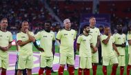 FIFA legends on the sidelines of friendly match against Workers at Al Thumama Stadium on Monday. 
