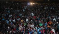 Pakistani football fans watch the live broadcast of the Qatar 2022 World Cup football semi-final match between Argentina and Croatia in the Lyari neighbourhood of Karachi on December 14, 2022. (Photo by Rizwan Tabassum / AFP)