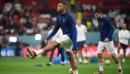 France's forward Kylian Mbappe warms up ahead of the Qatar 2022 World Cup semi-final football match between France and Morocco at the Al-Bayt Stadium in Al Khor, north of Doha on December 14, 2022. (Photo by FRANCK FIFE / AFP)