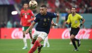 France's forward #10 Kylian Mbappe runs after the ball during the Qatar 2022 World Cup semi-final football match between France and Morocco at the Al-Bayt Stadium in Al Khor, north of Doha on December 14, 2022. (Photo by FRANCK FIFE / AFP)