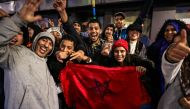 Morrocan Football fans react after the Qatar World Cup 2022 semi-final football match between Morocco and France, in the capital Rabat on December 14, 2022. (Photo by FADEL SENNA / AFP)
 