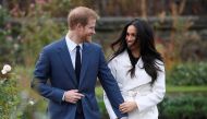 File Photo: Britain's Prince Harry with Meghan Markle in the Sunken Garden of Kensington Palace, London, Britain, November 27, 2017. (REUTERS/Toby Melville)