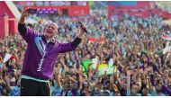 FIFA President Gianni Infantino taking a selfie with Qatar 2022 volunteers in the background during the Volunteer Celebration event.